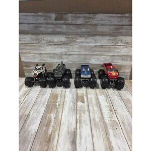 Lot of 4 Monster Jam Monster Trucks Bigfoot Hot Wheels Dalmatian Dragon Toys